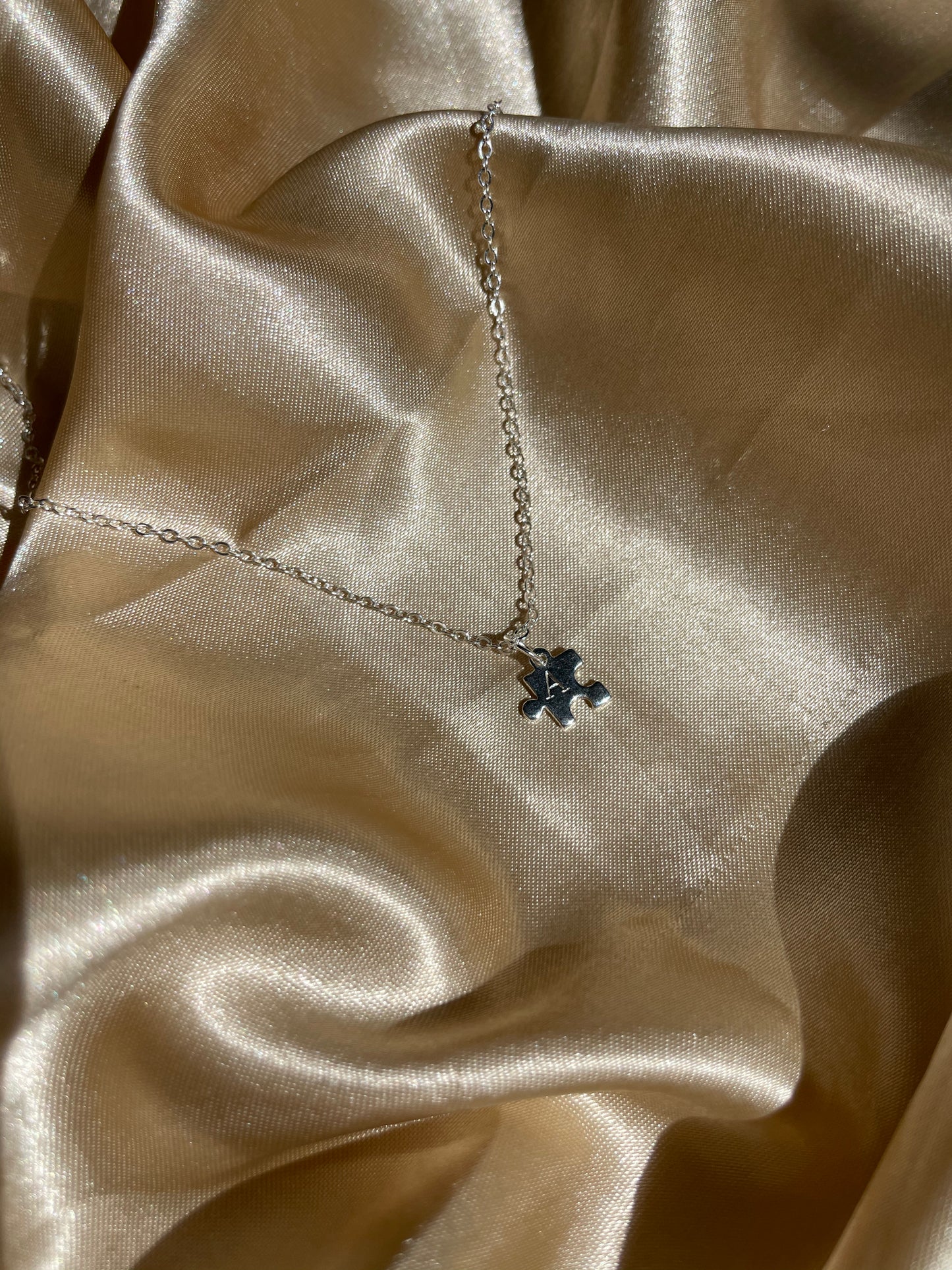 Silver Plated Puzzle Piece Necklace