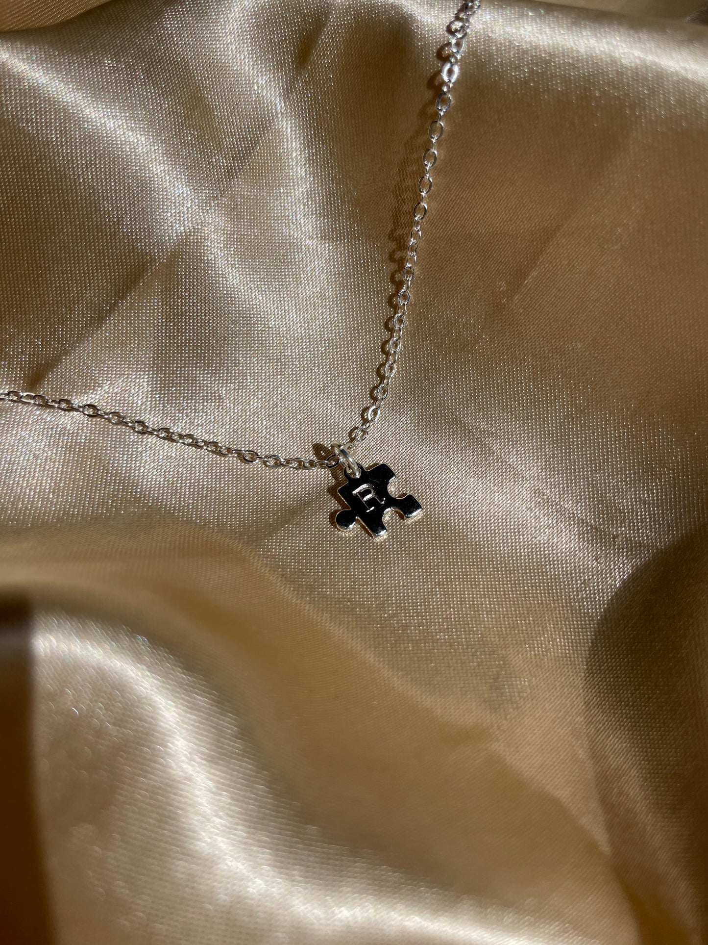 Silver Plated Puzzle Piece Necklace